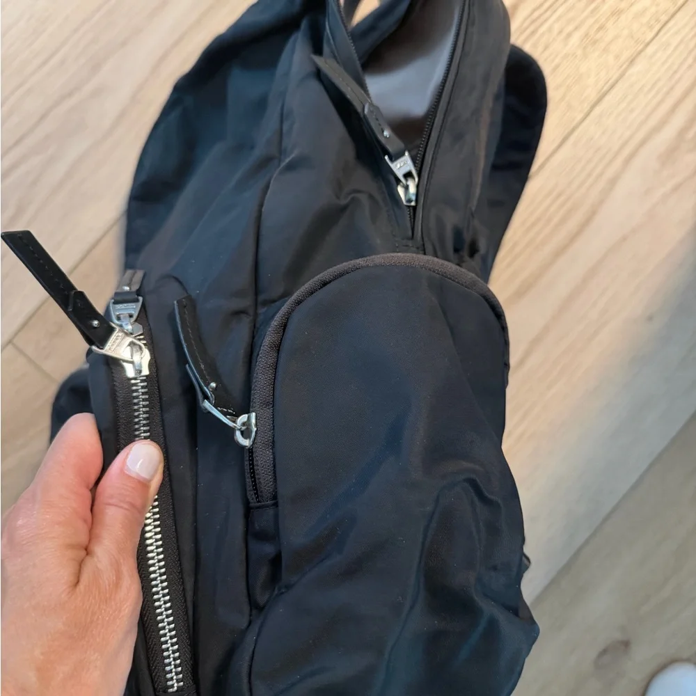 Tumi Black Nylon Backpack with Front Zip Pockets